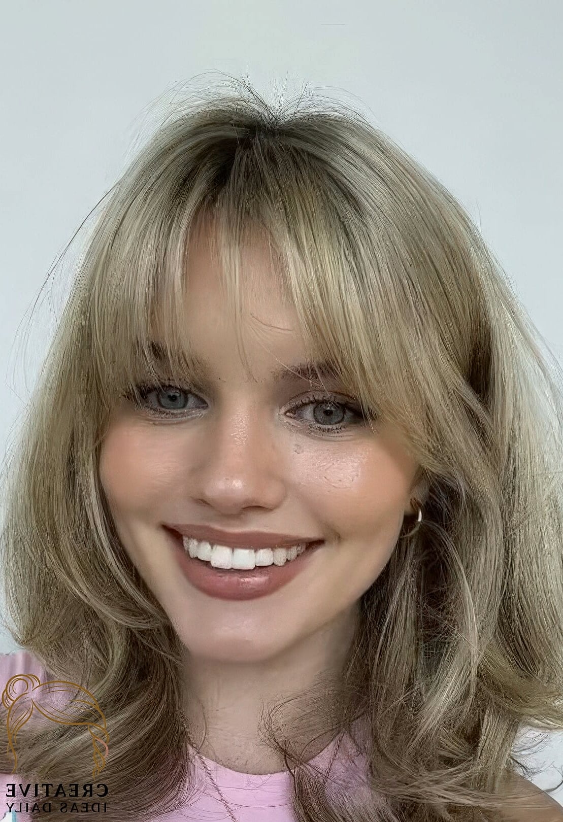 Butterfly Haircut With Wispy Bangs