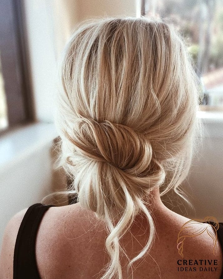 Effortless Undone Bun with Face-Framing Layers