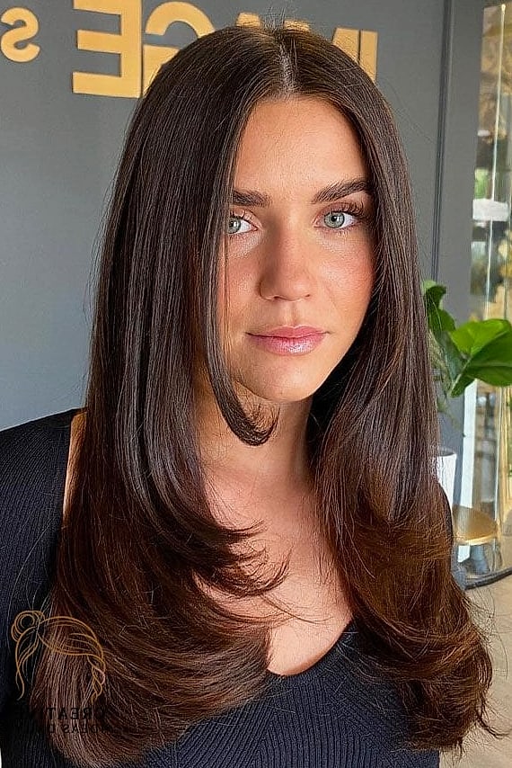 Long Hair with a Center-Parted Sleek Style