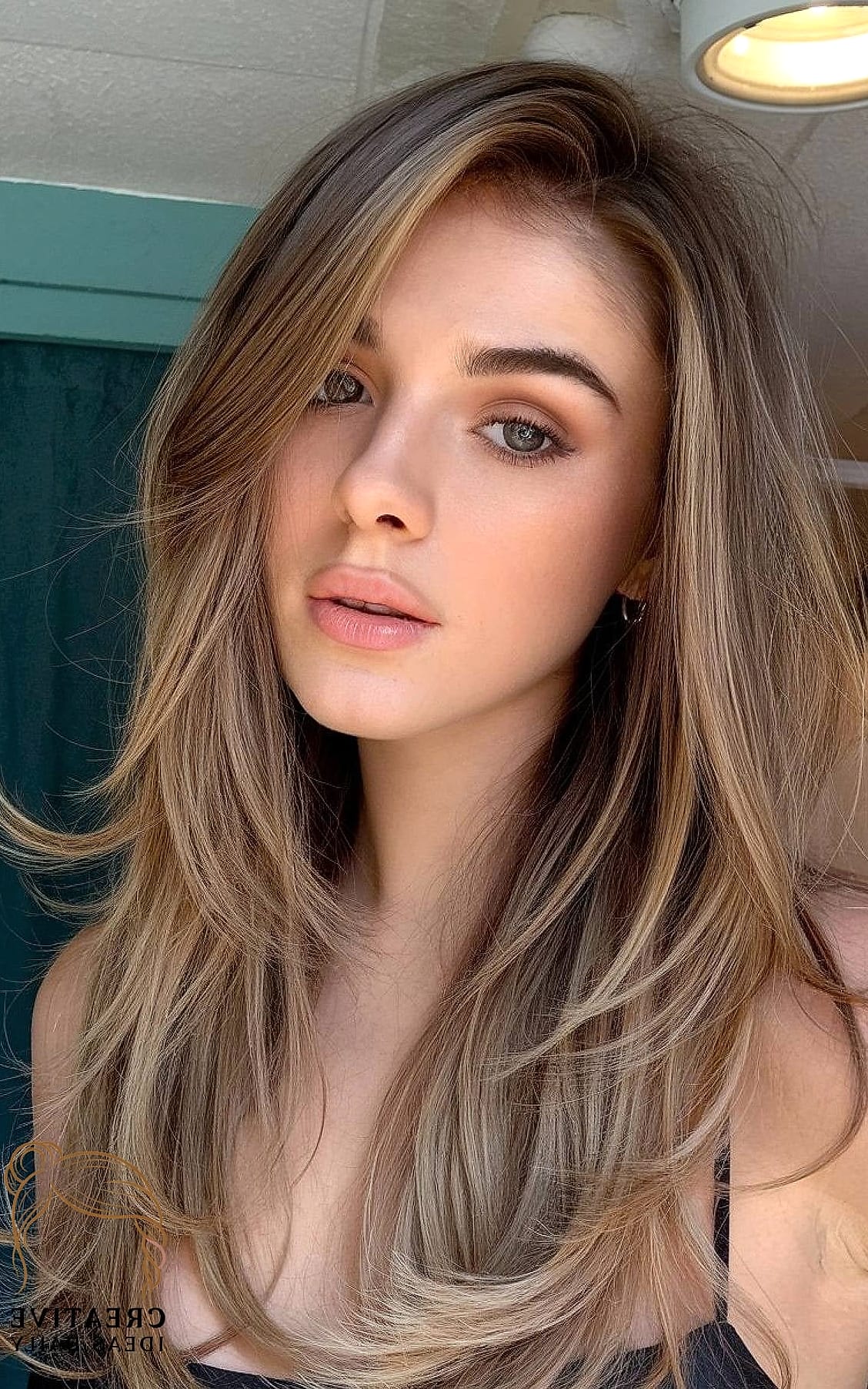 Long Hair With Deep Side Part And Layers