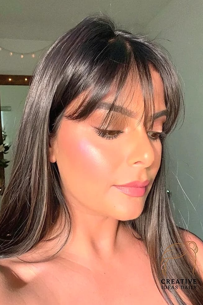 Long Layered Hair with Bottleneck Bangs