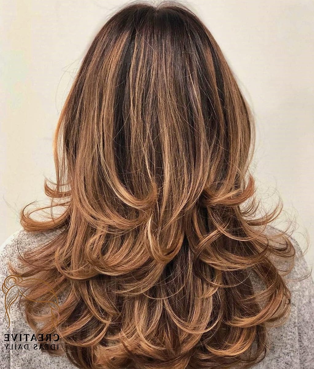 Long Layers With A Deep Side Swoop Bang