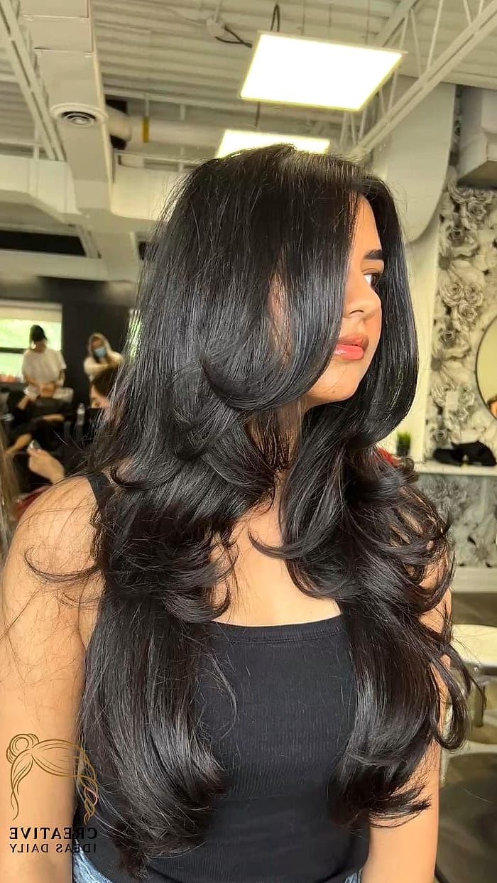 Long Layers with Curtain Bangs