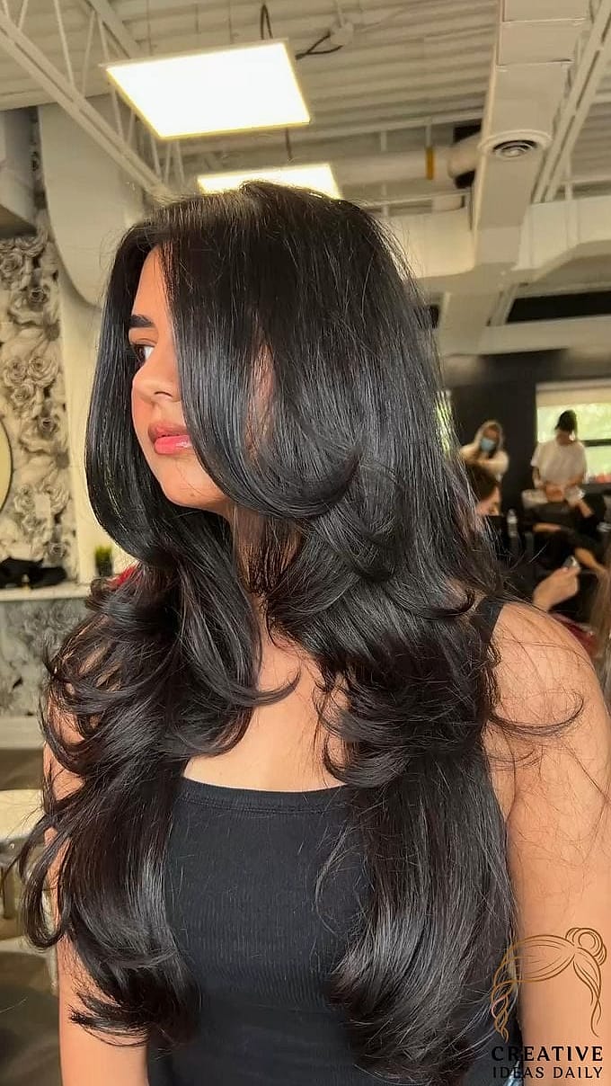 Long Layers with Side-Swept Bangs