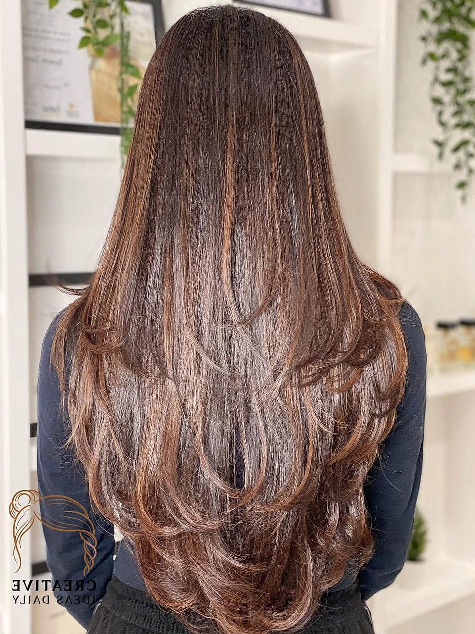 Long Layers With Curtain Bangs and Balayage