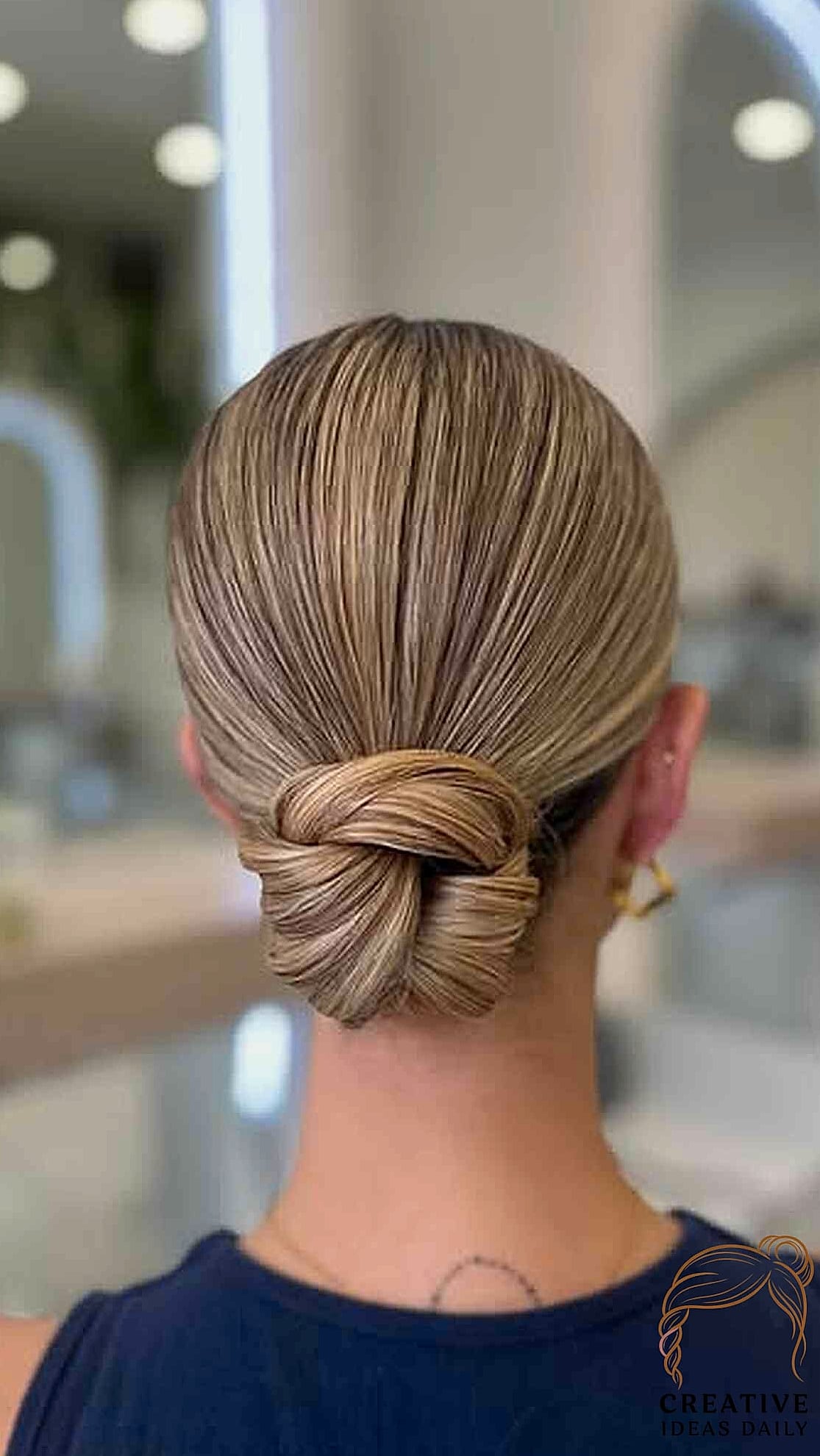 Low Bun with Face-Framing Pieces