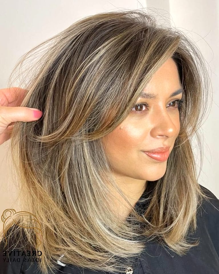 Medium Length Cut with Heavy Curtain Layers