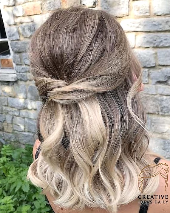 27 Medium Length Hair Ideas Every Woman Needs to See 18 Sleek Half-Up Style With Waves