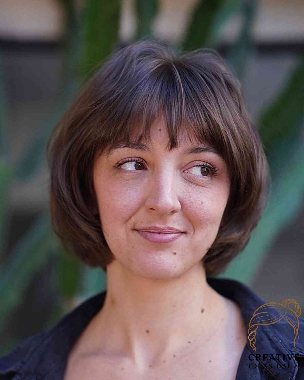 Soft Bangs and Layers for a Round Bob Cut