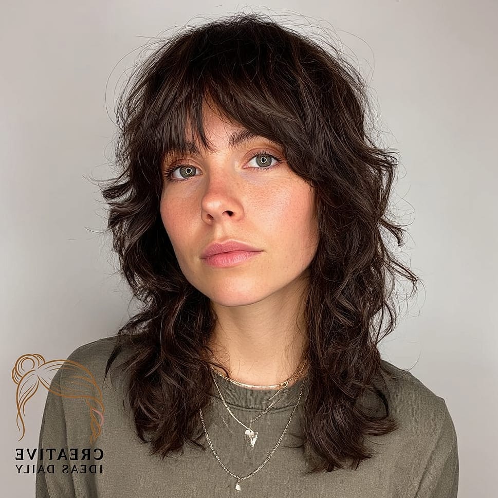 27 Medium Length Hair Ideas Every Woman Needs to See 17 Soft Shag With Curtain Bangs