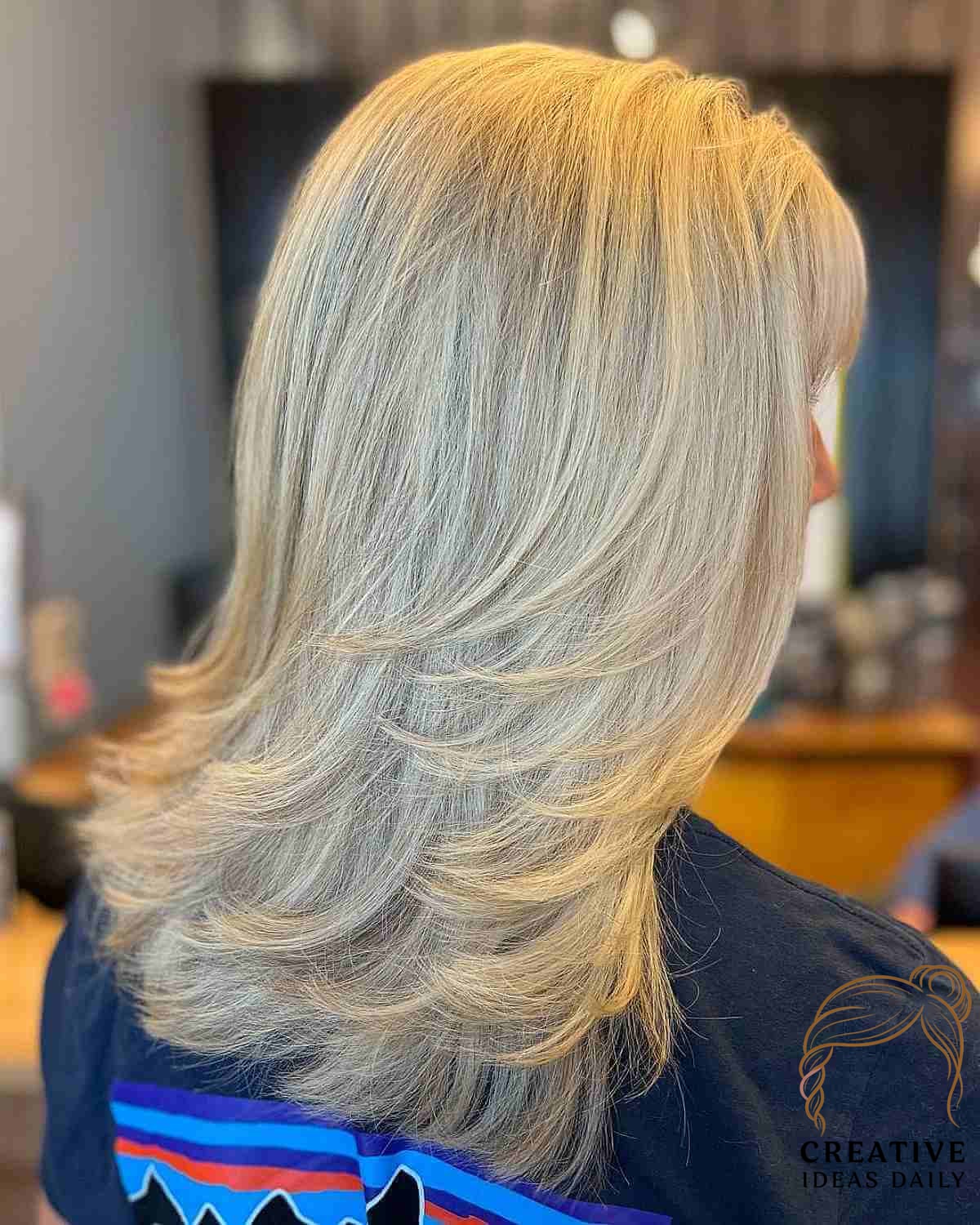 Stylish Medium Feathered Cut with Long Layers
