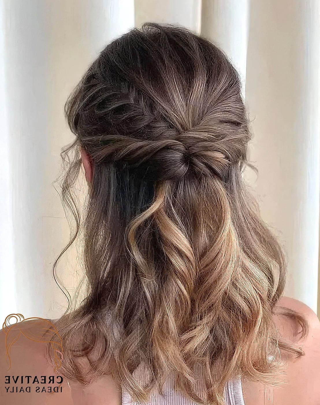 Twisted Half-Up With Braid Accent