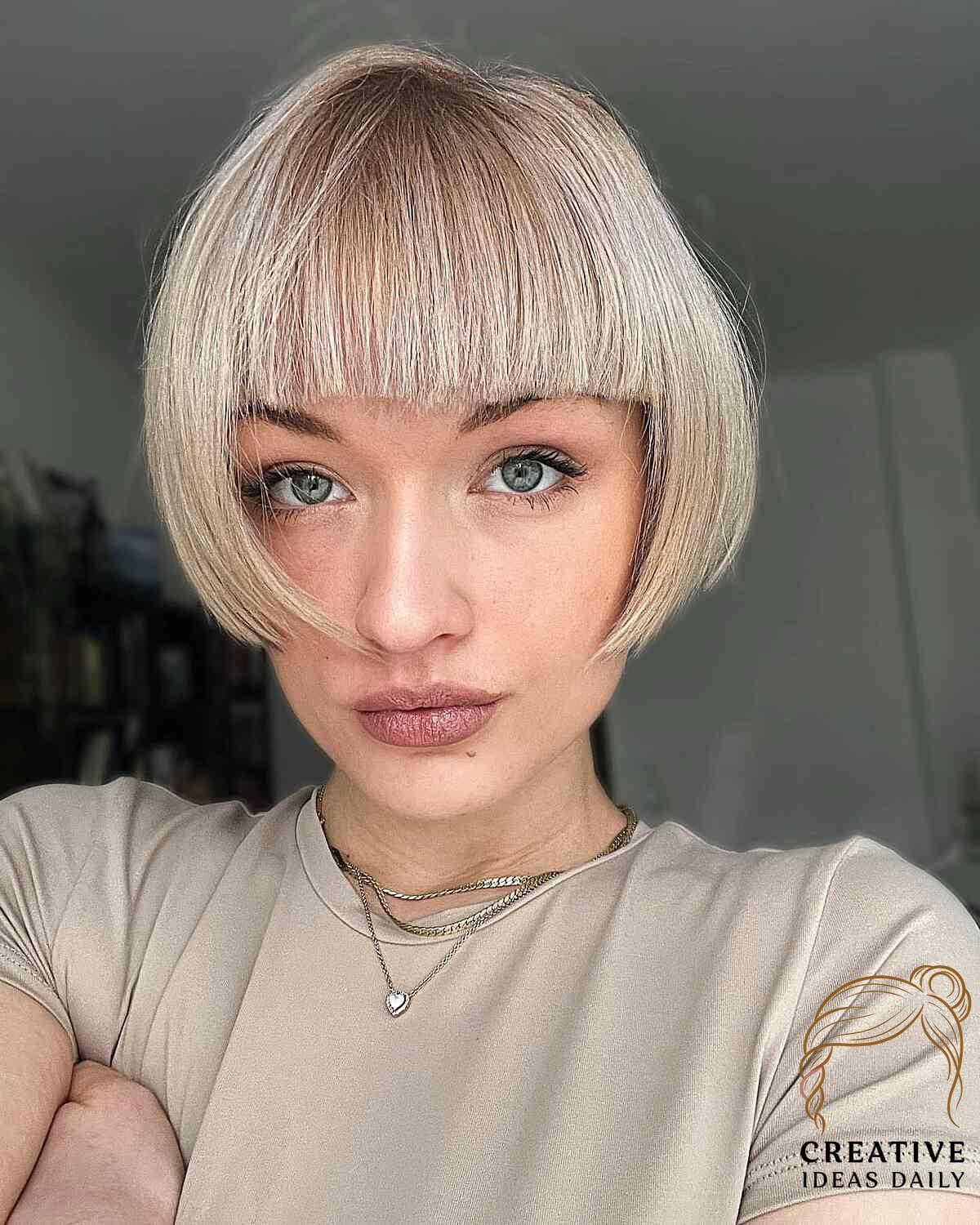 Very Short Hair with Blunt Bangs and Choppy Layers