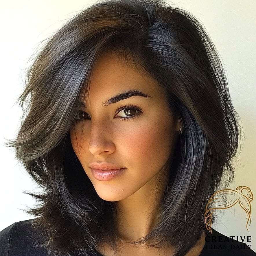 27 Medium Length Hair Ideas Every Woman Needs to See 22 Voluminous Blowout Style