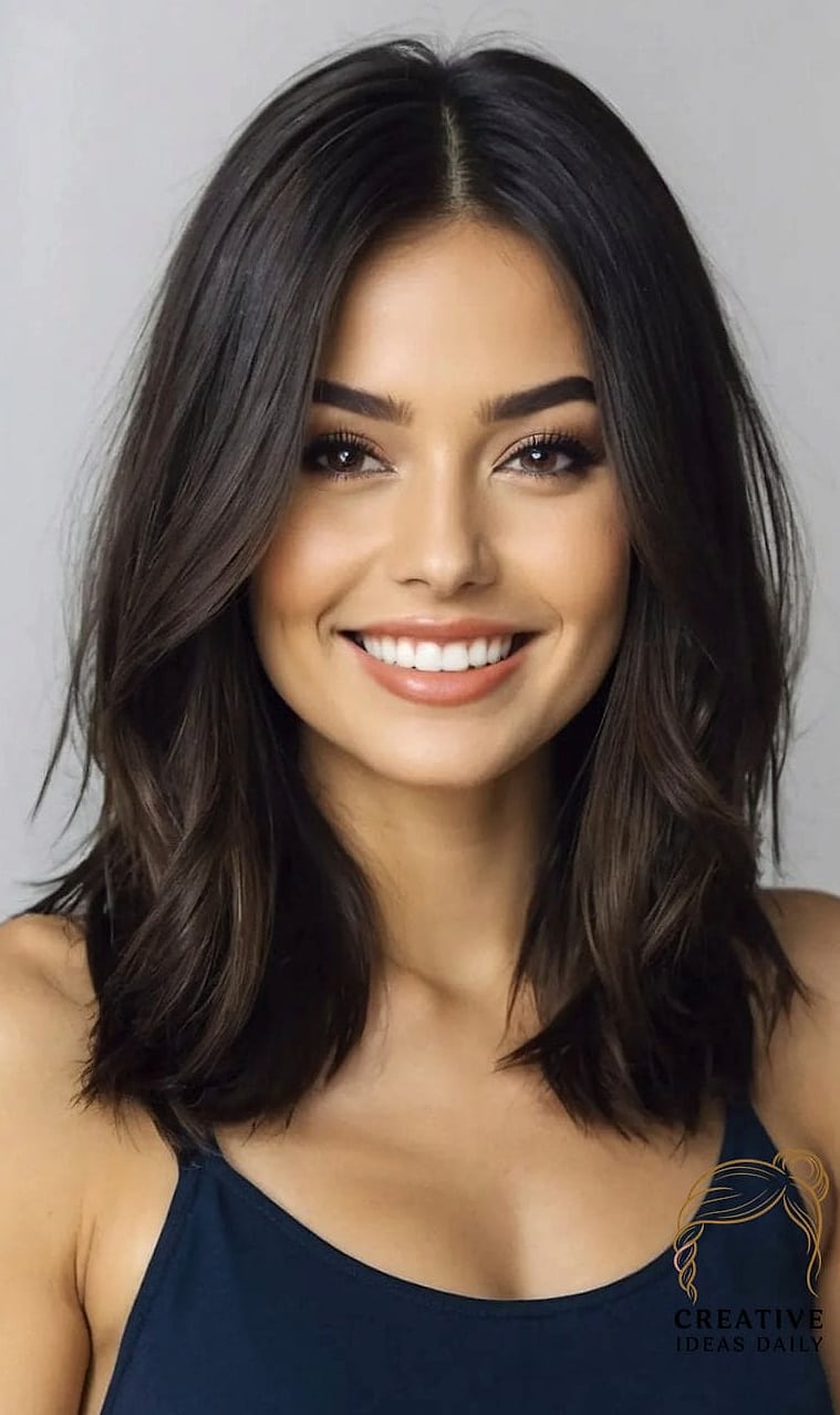 Voluminous Layered Cut with Long Face-Framing Layers